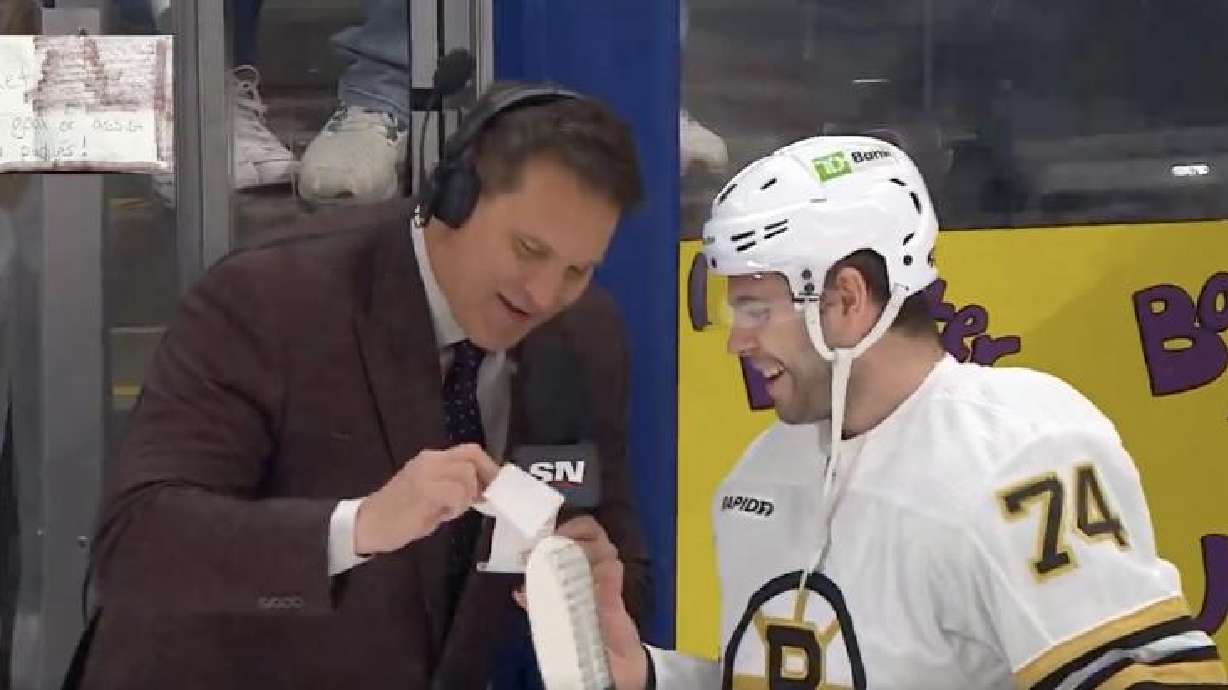 SportsNet analyst Louie DeBrusk cashes a year-old coupon from his son Jake.