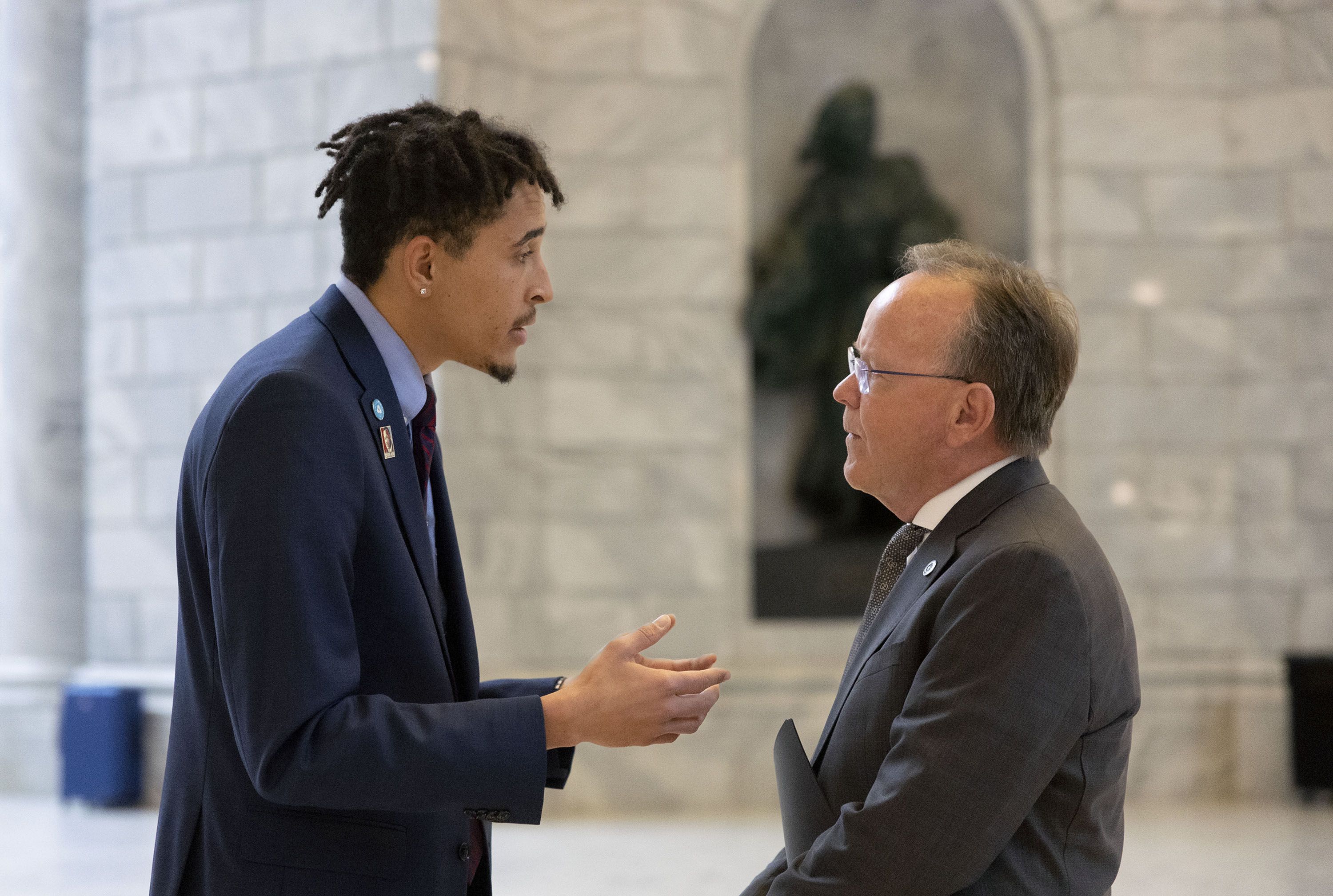 MJ Powell speaks to Senate President Stuart Adams, R-Layton, about DEI legislation during NAACP State Legislative Advocacy Day at the Capitol in Salt Lake City on Wednesday, Feb. 21, 2024.