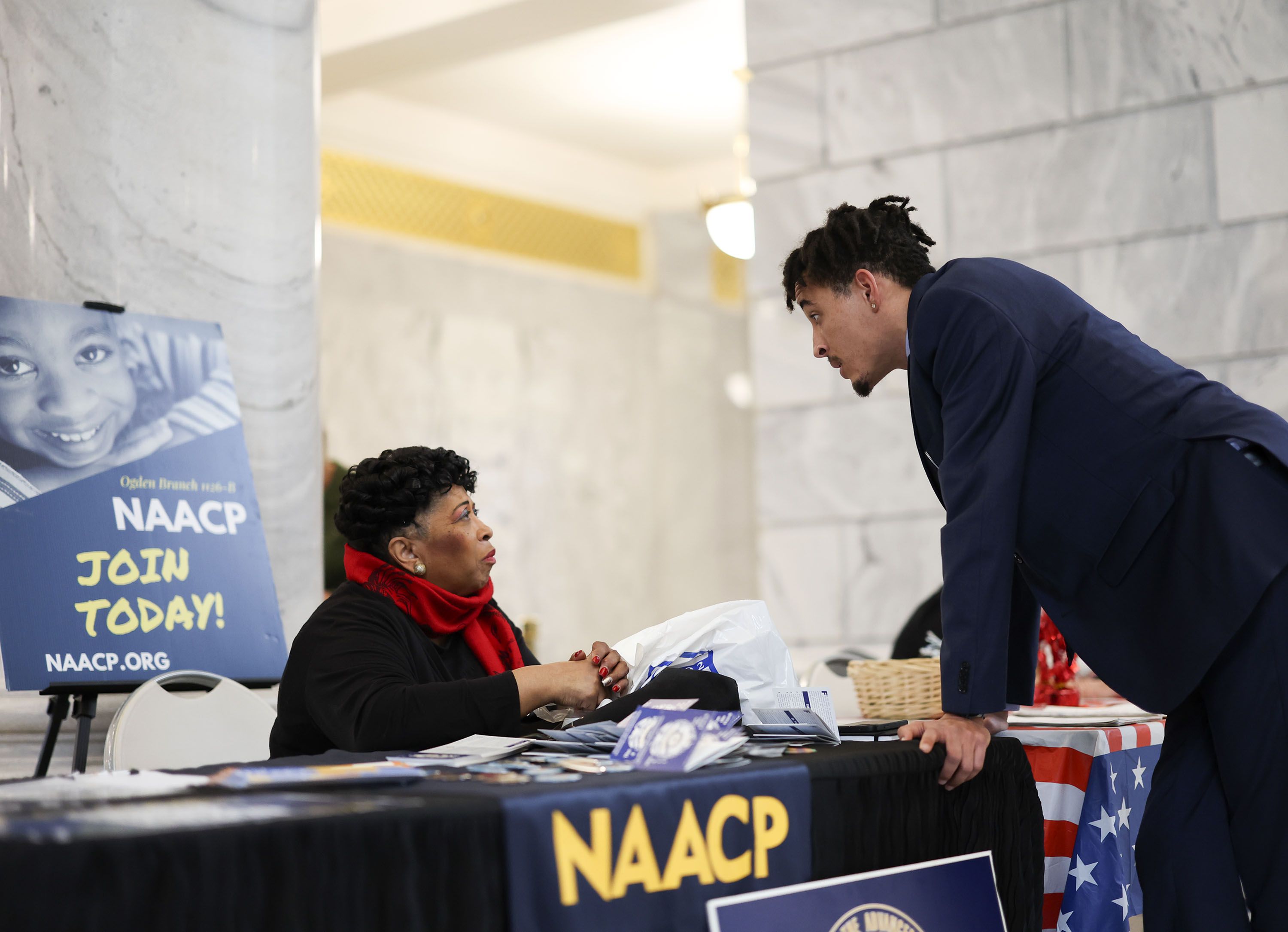 Jeanetta Williams, NAACP Salt Lake Branch president, speaks with MJ Powell during NAACP State Legislative Advocacy Day at the Capitol in Salt Lake City on Wednesday, Feb. 21, 2024.