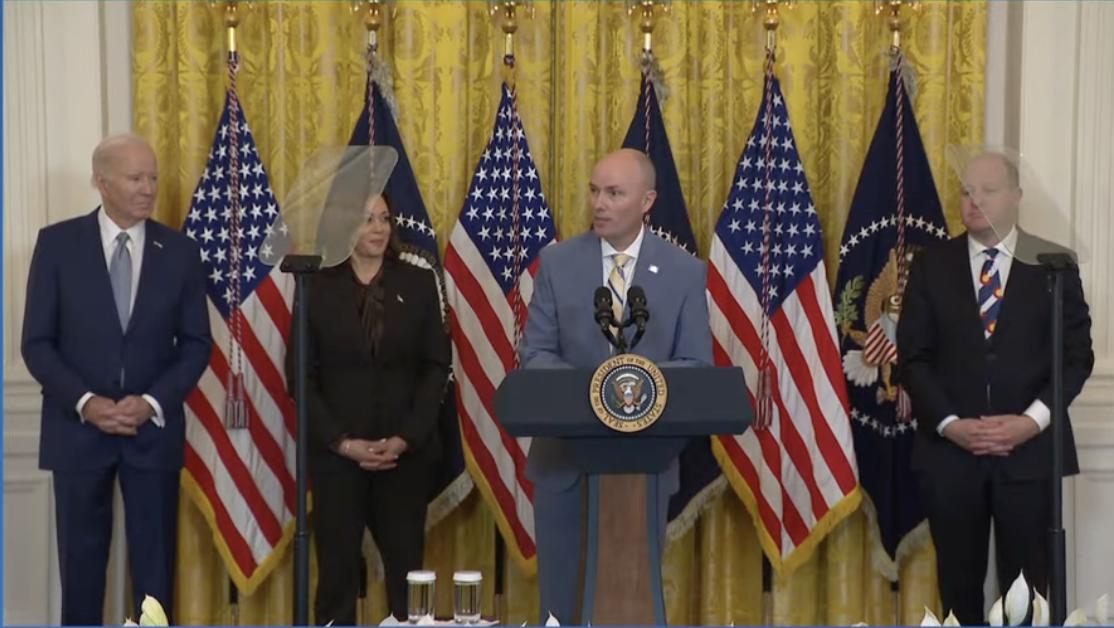 President Joe Biden, left, Vice President Kamala Harris, and Colorado Gov. Jared Polis look on as Utah Gov. Spencer Cox speaks during a press briefing at the White House in Washington on Friday.