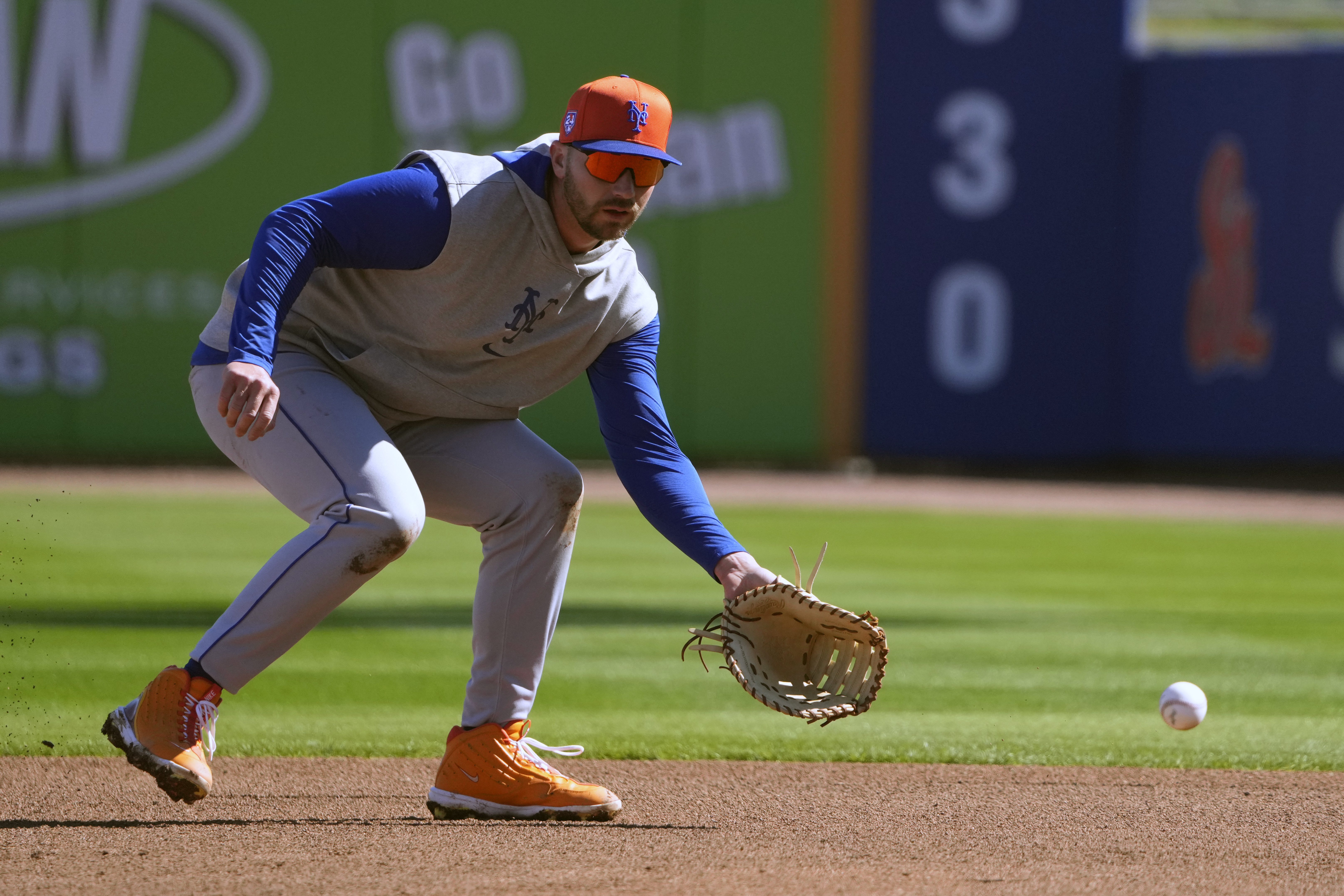New York Mets' Pete Alonso handles a grounder during a spring training baseball workout Tuesday, Feb. 20, 2024, in Port St. Lucie, Fla. 
