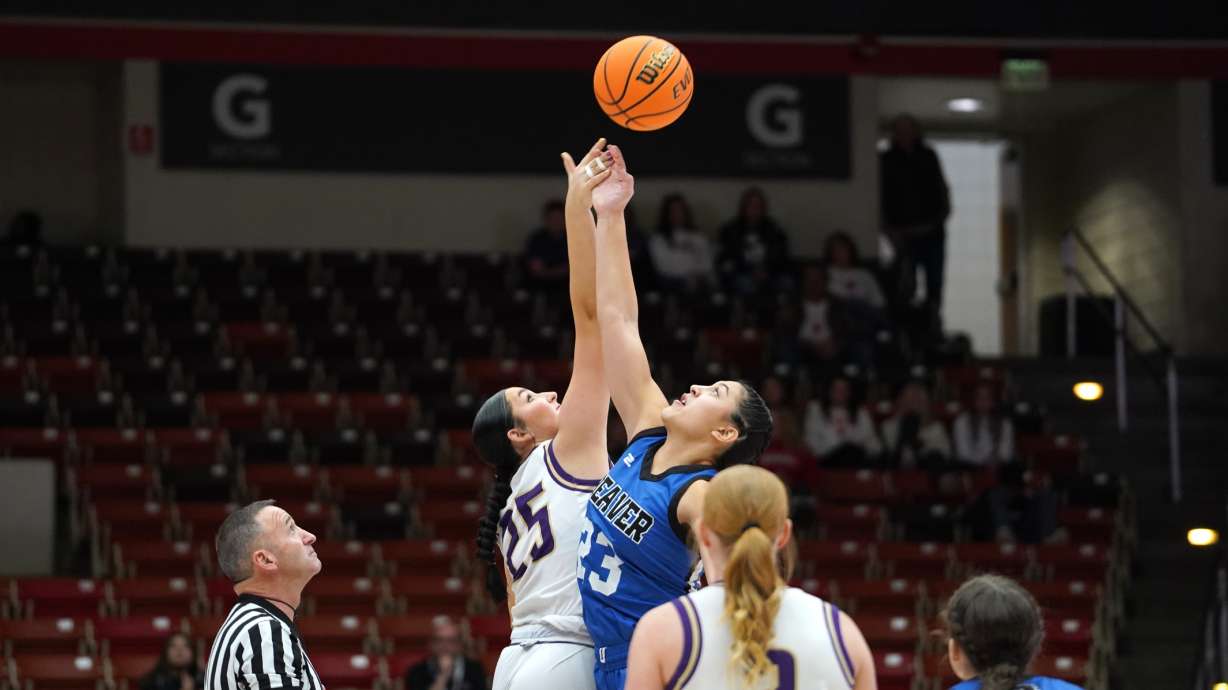 North Summit's Chezlie Langston and Beaver's Talia Alisa fight for the tip-off.