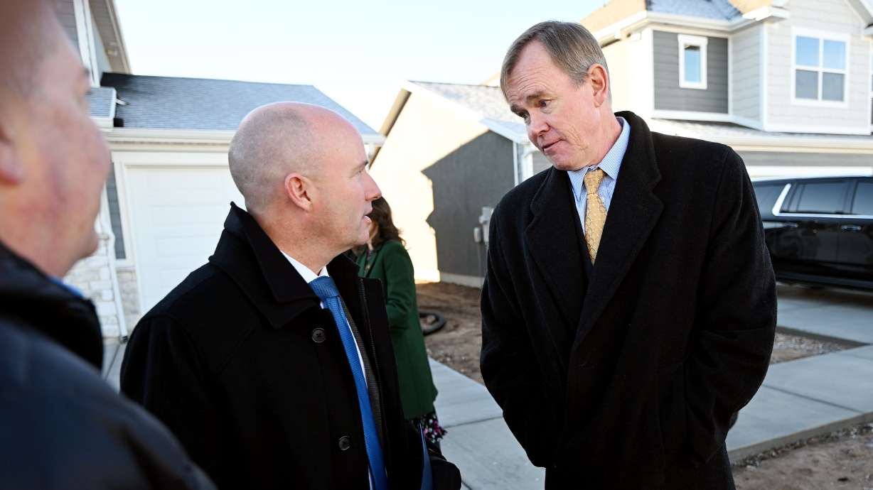 Gov. Spencer Cox talks with Steve Waldrip in West Haven on Dec. 5, 2023. He was named head of the new Utah Division of Housing and Community Development Wednesday.