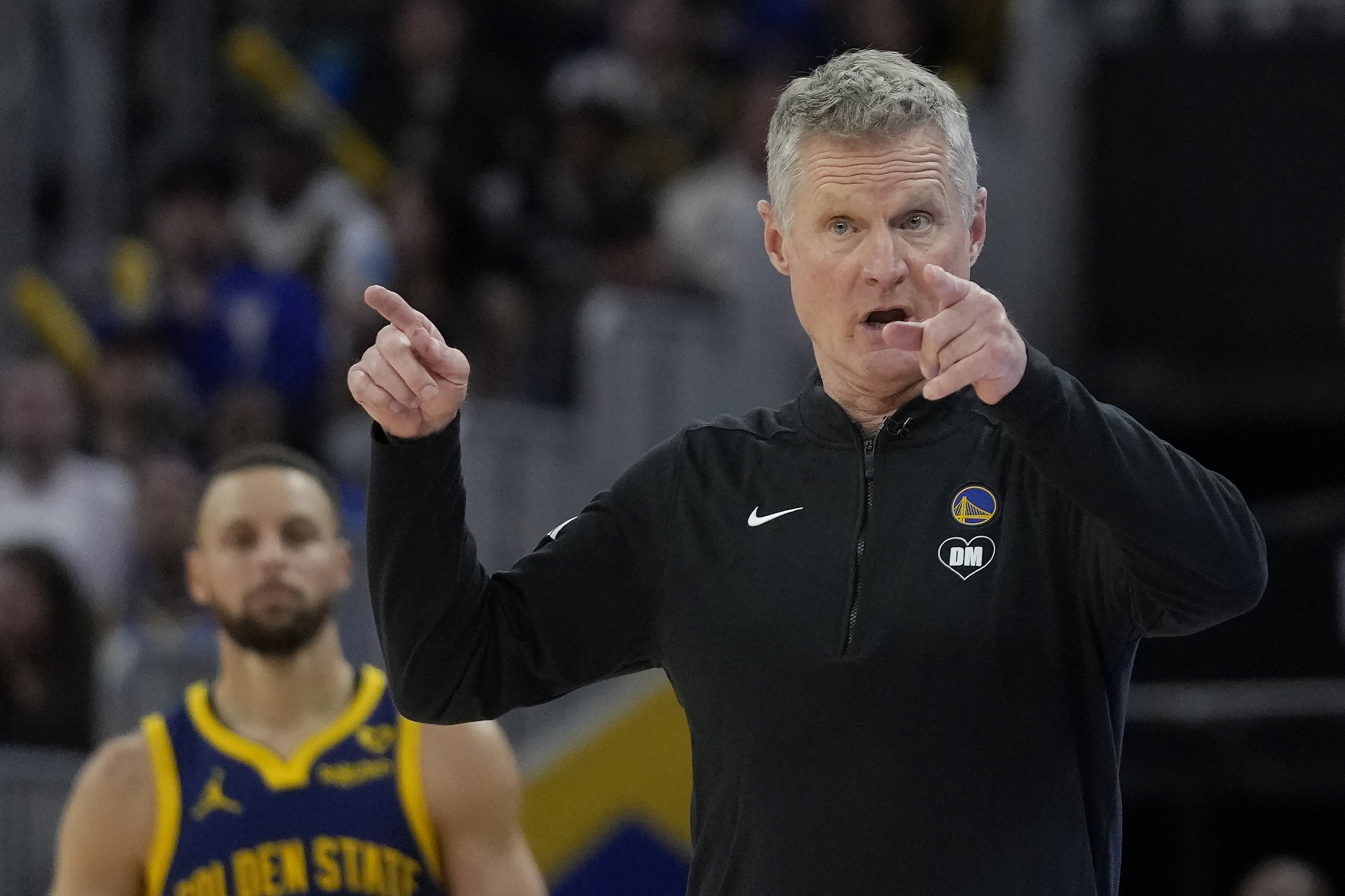 Golden State Warriors coach Steve Kerr gestures to players during the second half of the team's NBA basketball game against the Los Angeles Lakers in San Francisco, Thursday, Feb. 22, 2024.