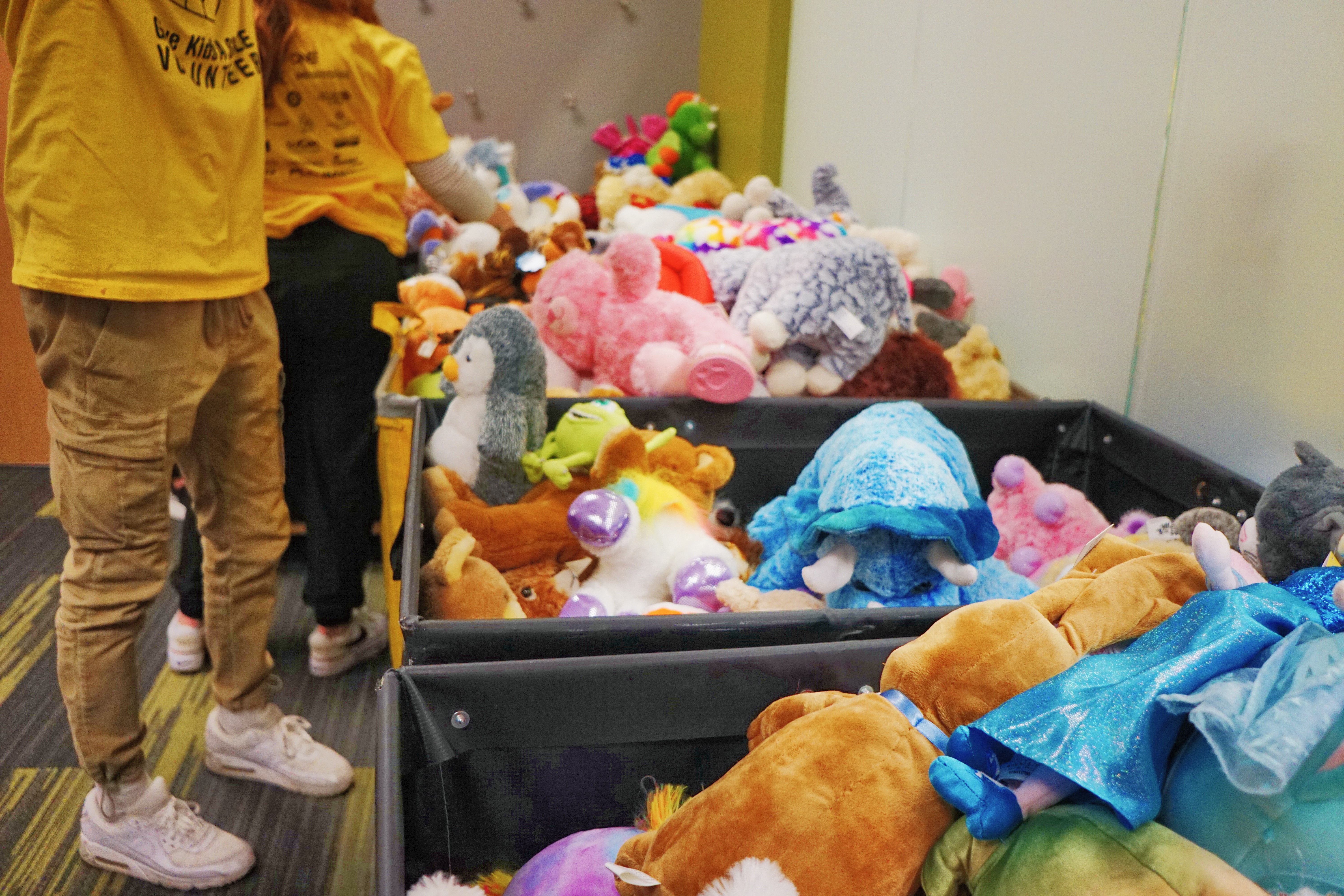 Bins of donated stuffed animals are distributed to children who received free dental care during the University of Utah's annual "Give Kids A Smile" event Saturday at the U.