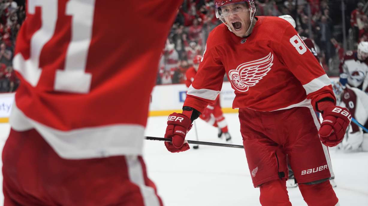 Detroit Red Wings right wing Patrick Kane (88) celebrates his goal against the Colorado Avalanche during overtime in an NHL hockey game Thursday, Feb. 22, 2024, in Detroit.