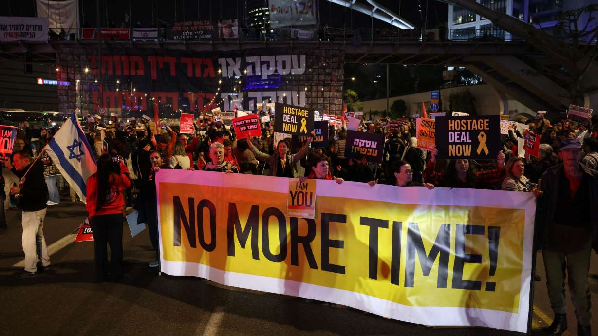 A rally calling for the release of hostages held in Tel Aviv on Feb. 8. Negotiators have come to an "understanding" of a potential deal to release hostages held by Hamas in exchange for a temporary ceasefire in Gaza.