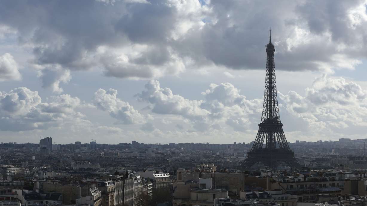 FILE - The Eiffel Tower is pictured from the top of the Arc de Triomphe, Monday, Feb. 12, 2024 in Paris. Visits to the Eiffel Tower were disrupted on Monday Feb.19, 2024 because of a strike over poor financial management of the monument that is one of the world's most-visited sites. (AP Photo/Aurelien Morissard, File