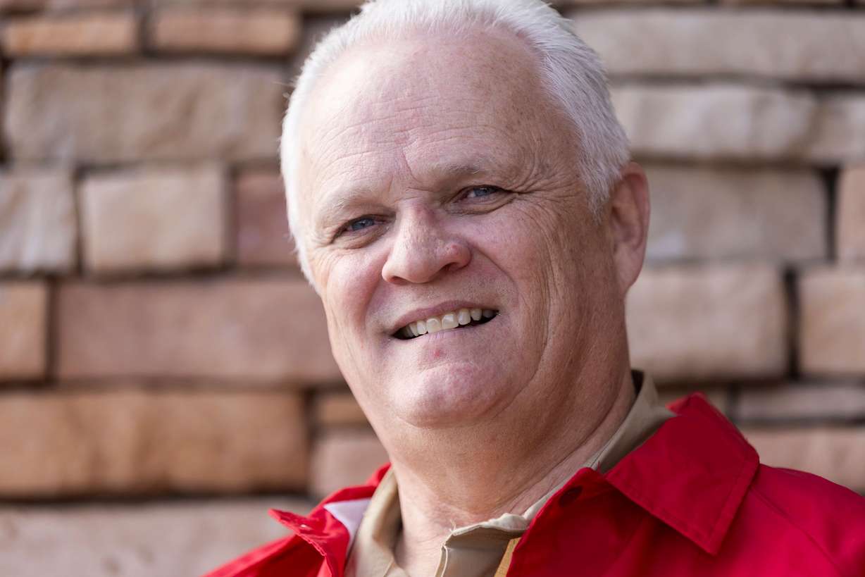 Val Parrish poses for a portrait after volunteering with Troop 1996 during a food drive at Smith’s Grocery in West Valley City on Feb. 10.