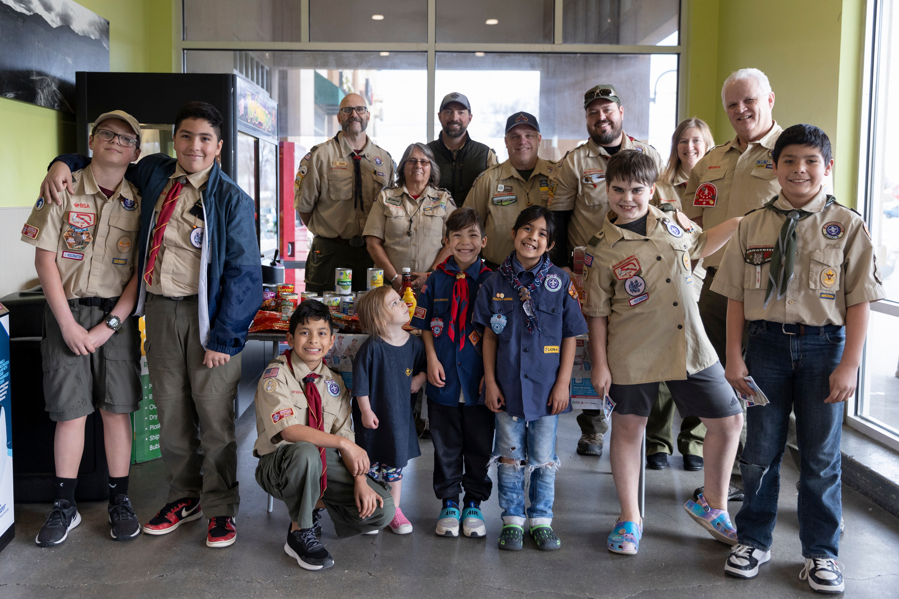 Val Parrish volunteers with Troop 1996 during a food drive at Smith’s Grocery in West Valley City on Feb. 10.