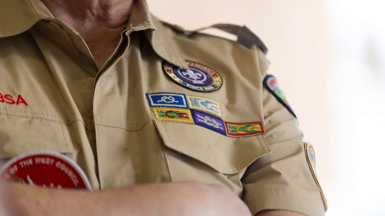 Val Parrish volunteers with Troop 1996 during a food drive at Smith’s Grocery in West Valley City on Feb. 10.