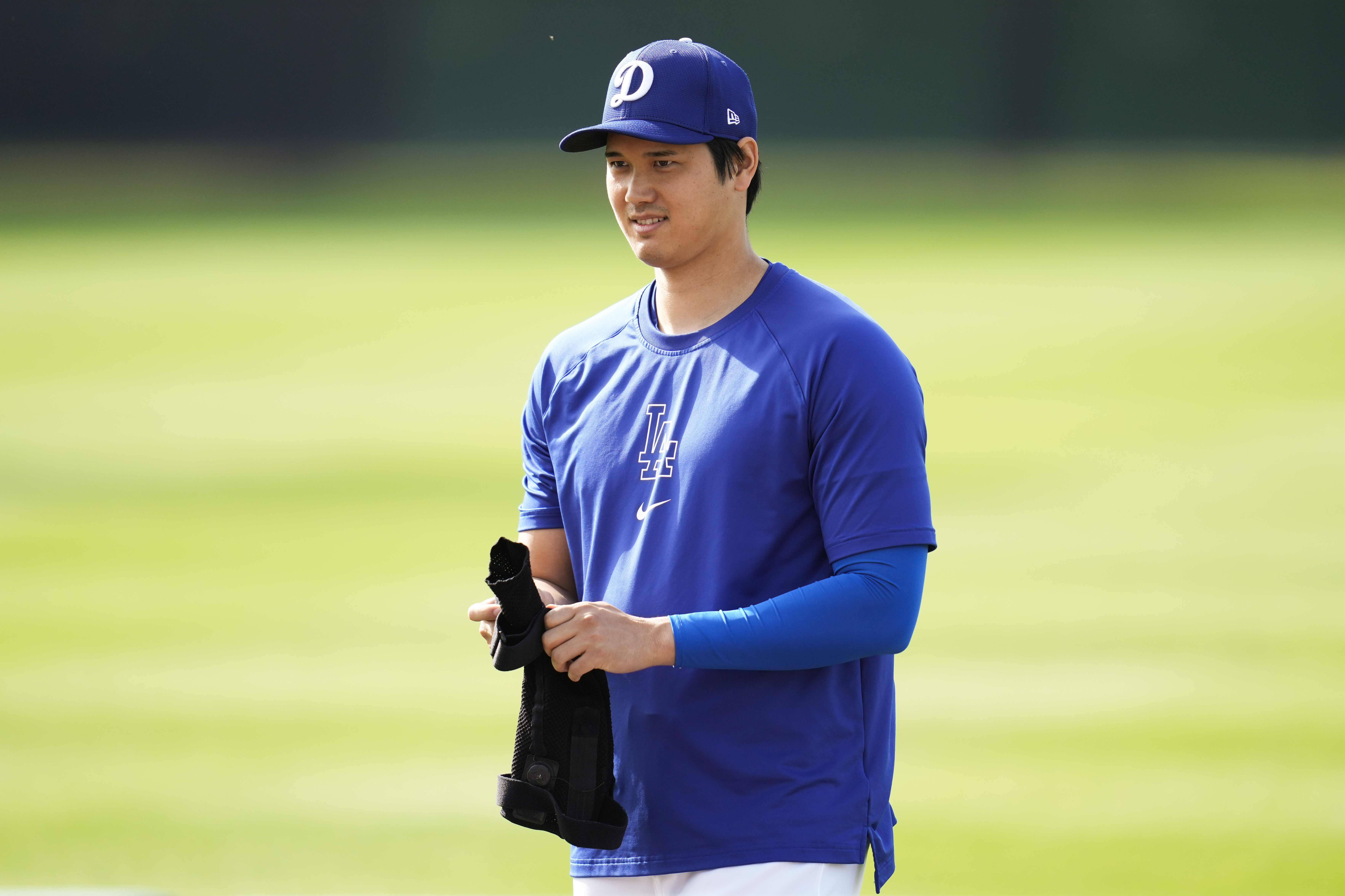 Los Angeles Dodgers designated hitter Shohei Ohtani participates in spring training baseball workouts at Camelback Ranch in Los Angeles, Sunday, Feb. 25, 2024.