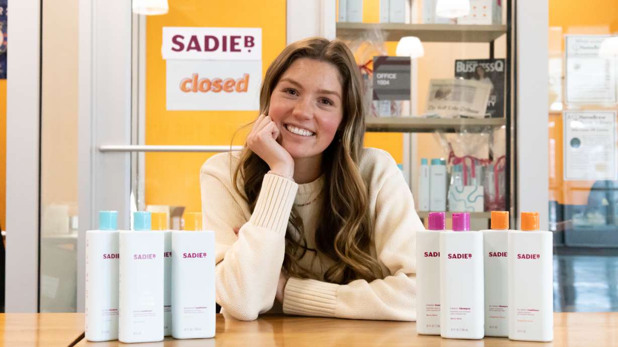 Sadie Bowler, co-founder and CEO of SadieB Personal Care is pictured with products from her company's line. SadieB Personal Care on Tuesday launched eight shampoos and conditioners from its product line in 507 Target stores.
