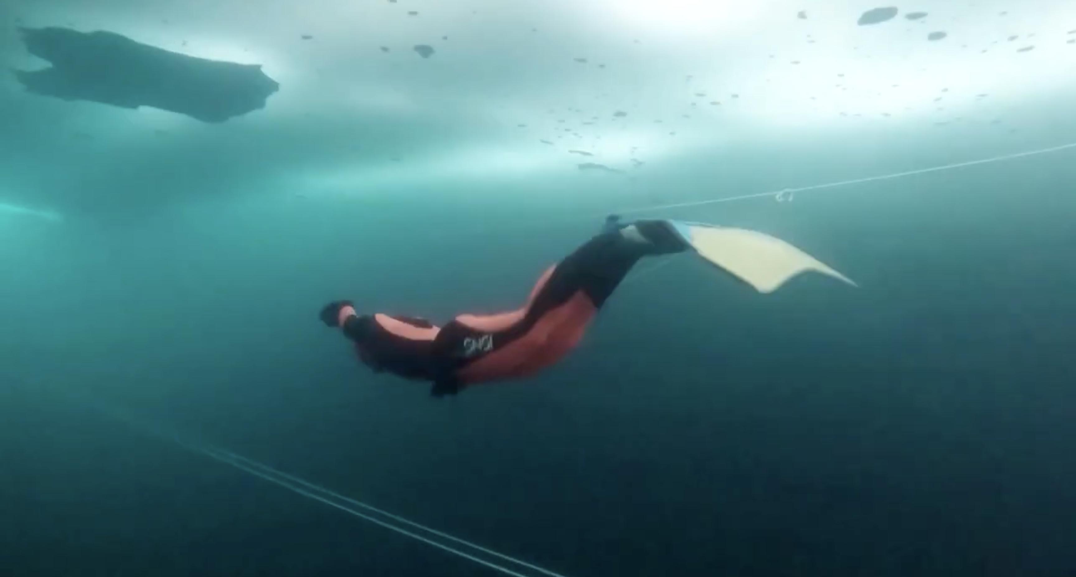 Ice diver Valentina Cafolla took back her Guinness World Record for the longest ice dive just 36 hours after it was broken, braving a water temperature of just 37 degrees.