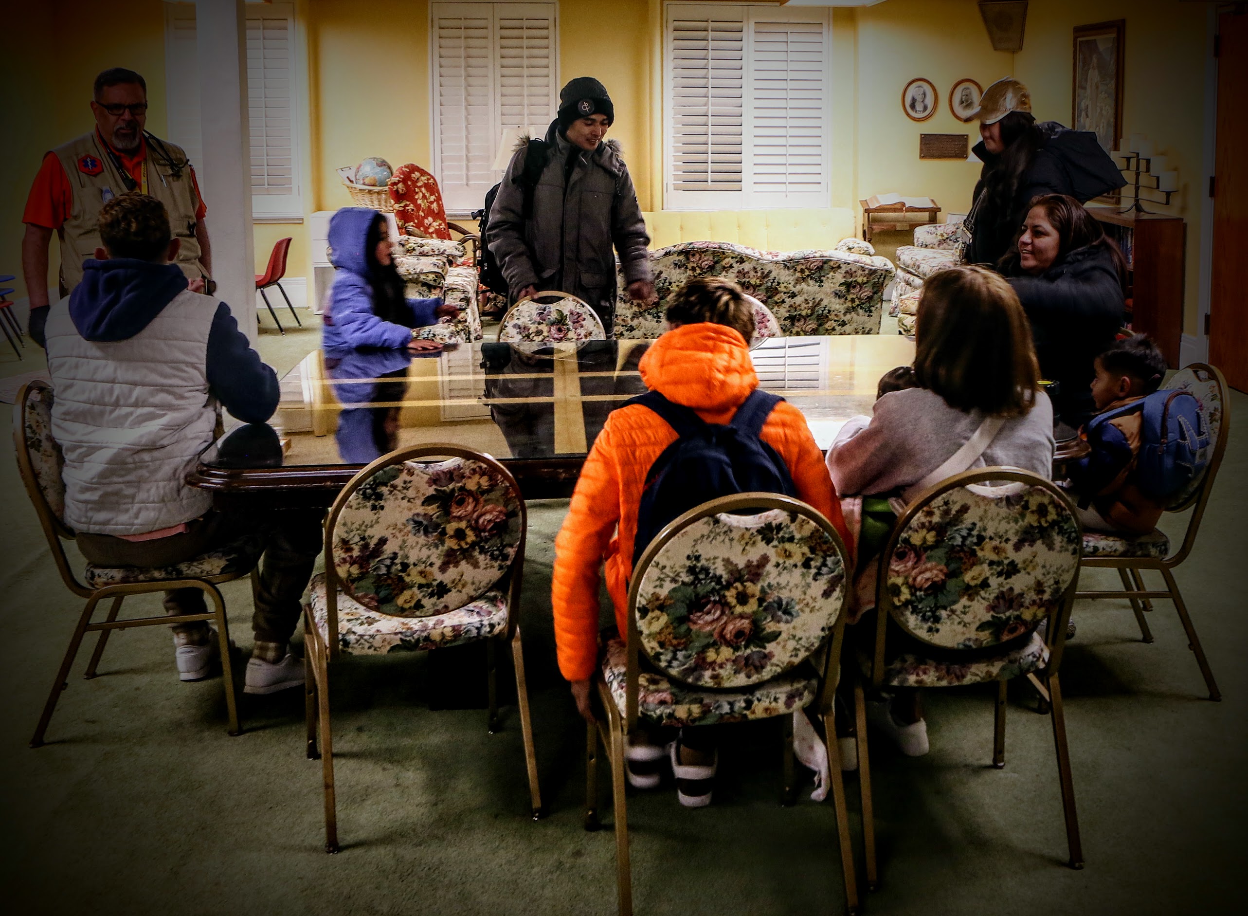 A Venezuelan family waits for arrangements while at the First United Methodist Church in Salt Lake City after being flown from New York City on Feb. 10.