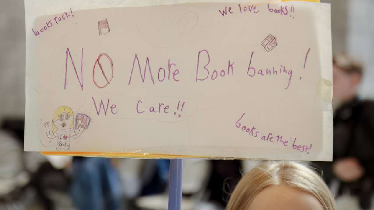 A sign is shown at a read-in at the state Capitol hosted by Let Utah Read on Feb. 22. A coalition of Utah organizations on Tuesday sent a letter asking the governor to veto HB29, which targets books for removal from school libraries.