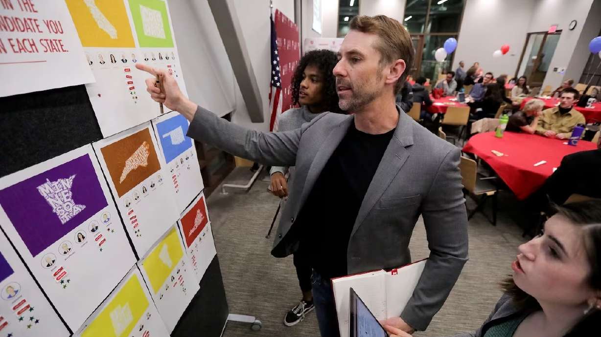 Hinckley Institute of Politics political science chair Brent Steele and his daughter Annabelle Steele compare predictions to state results in Salt Lake City on March 3, 2020. Utahns will not hold a primary election for Super Tuesday.