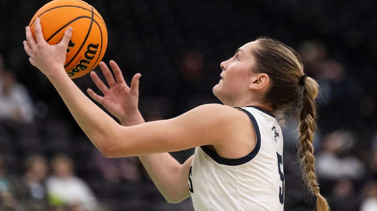 Ridgeline's Emilee Skinner drives to the basket against Payson in the 4A girls basketball semifinals Tuesday afternoon at the UCCU Center.