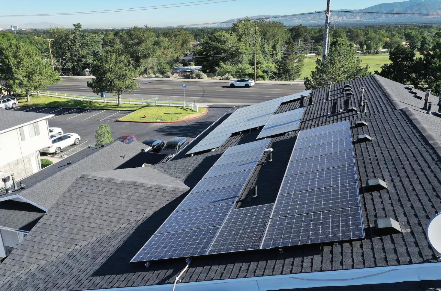Solar panels on an apartment complex in Cottonwood Heights on July 12, 2023. A bill that some clean energy advocates fear could deter rooftop solar purchases but supporters say protects consumers was heard in a legislative committee on Tuesday.
