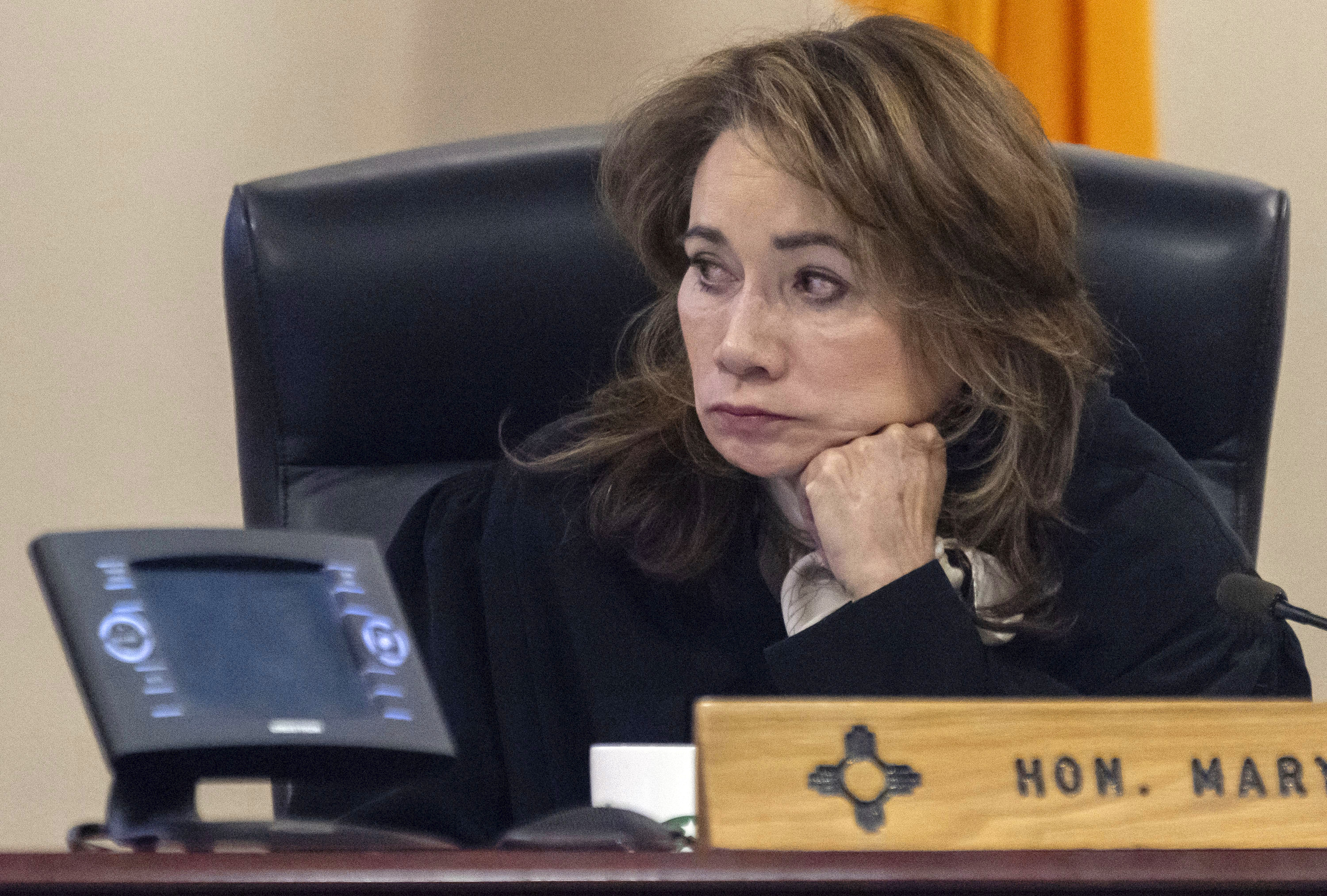District judge Mary Marlowe Sommer listens to FBI forensic examiner Bryce Ziegler testify during Hannah Gutierrez-Reed's trial at District Court, Monday, in Santa Fe, N.M.