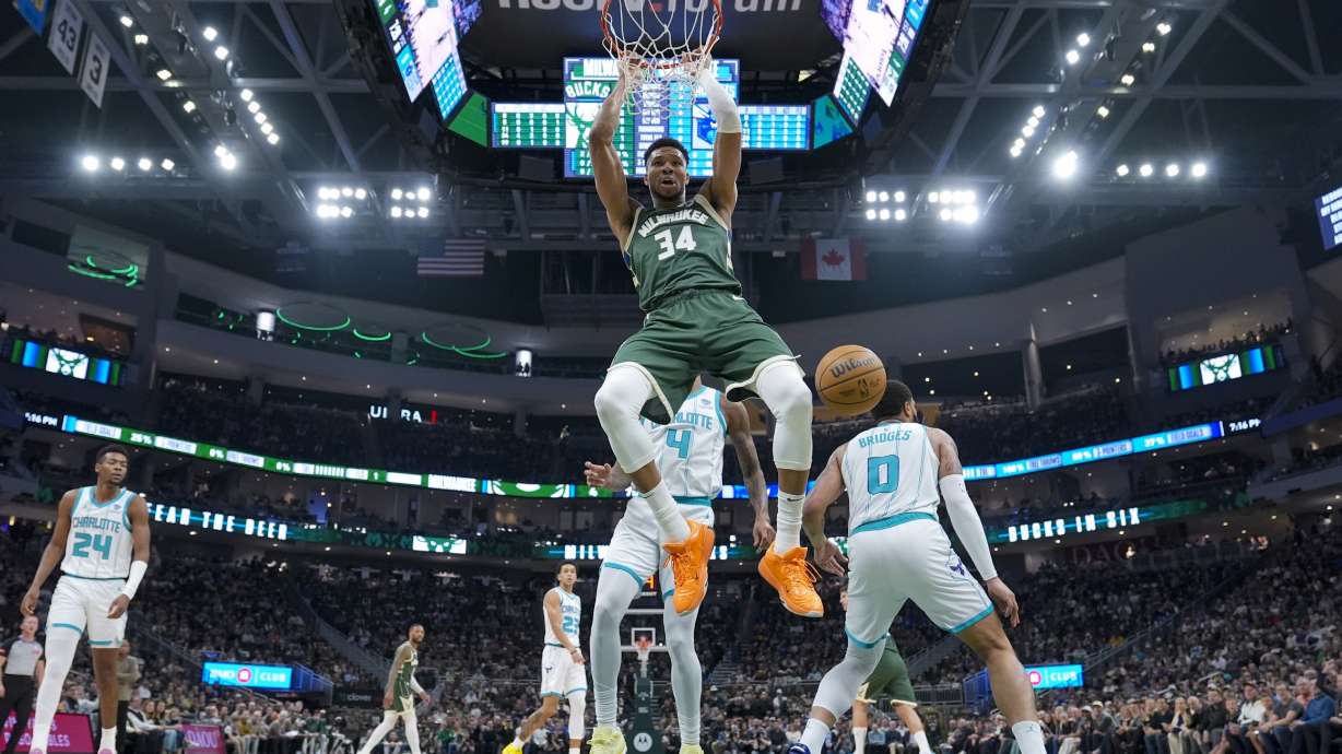 Milwaukee Bucks' Giannis Antetokounmpo dunks during the first half of an NBA basketball game against the Charlotte Hornets Tuesday, Feb. 27, 2024, in Milwaukee.