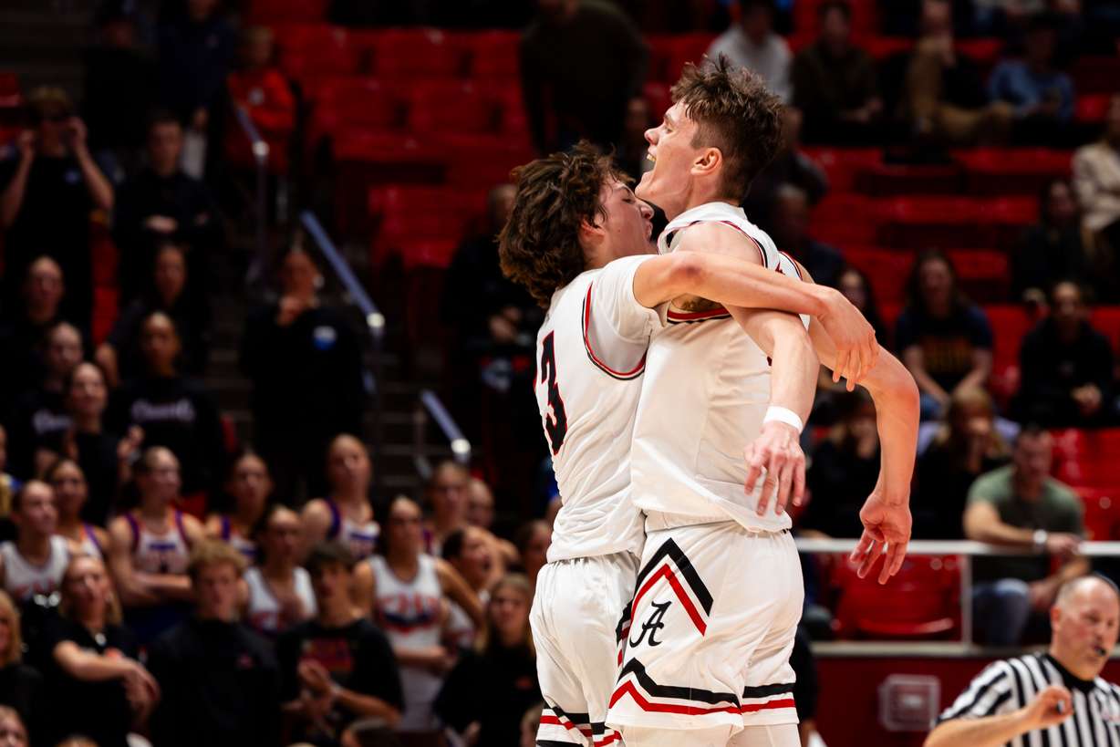 Alta celebrates their 72-60 win over Timpview in the semifinals for 5A high school boys basketball at the Jon M. Huntsman Center in Salt Lake City on Tuesday, Feb. 27, 2024.