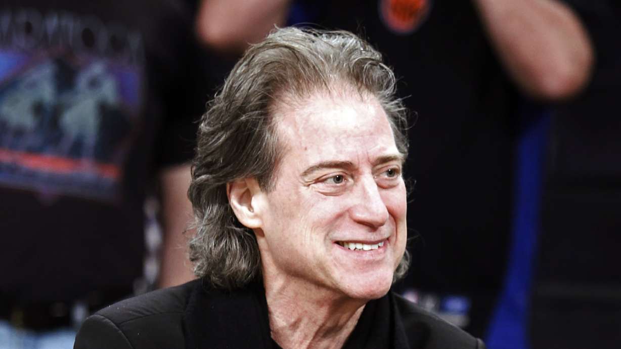 Comedian Richard Lewis attends an NBA basketball game in Los Angeles on Dec. 25, 2012. Lewis, an acclaimed comedian known for exploring his neuroses in frantic diatribes, leading to his nickname "The Prince of Pain," has died.