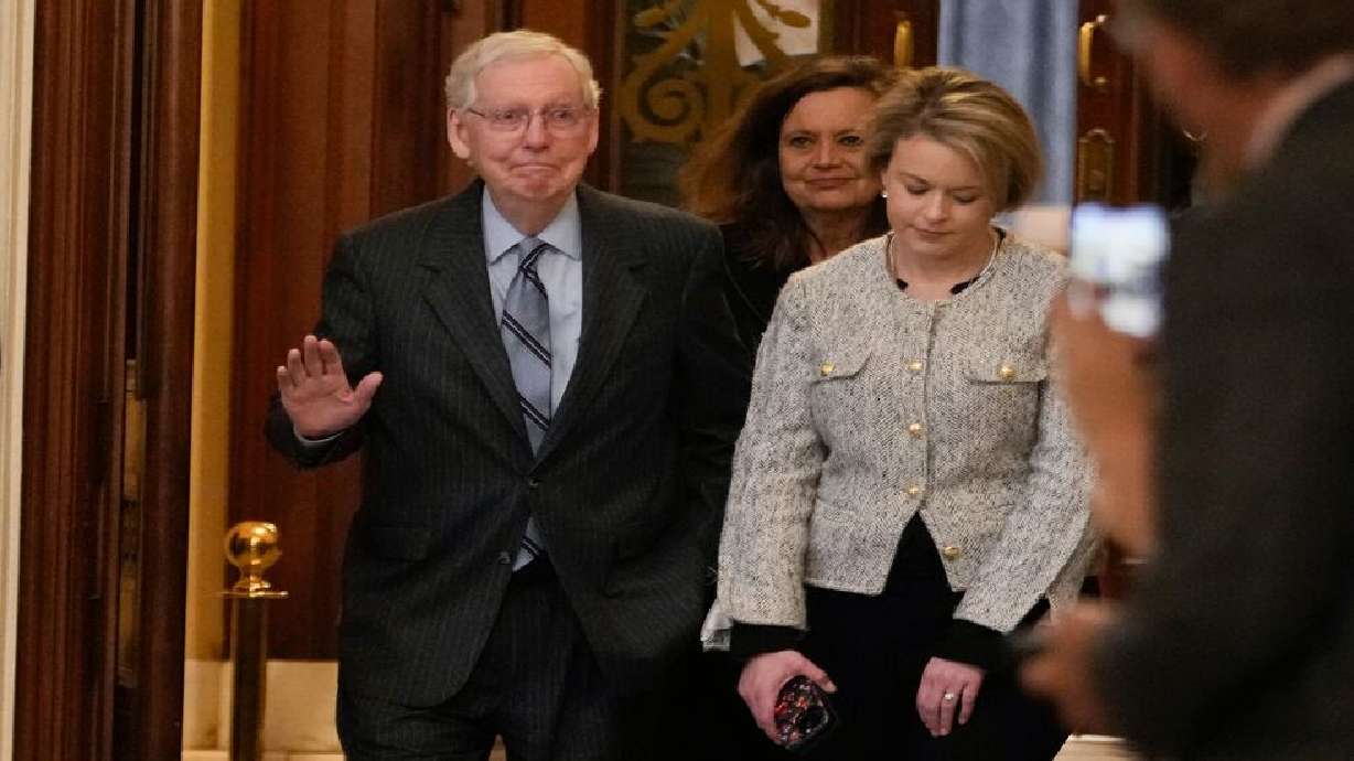 Senate Minority Leader Mitch McConnell of Kentucky walks off the Senate floor after speaking Wednesday at the Capitol in Washington. McConnell says he'll step down as Senate Republican leader in November.