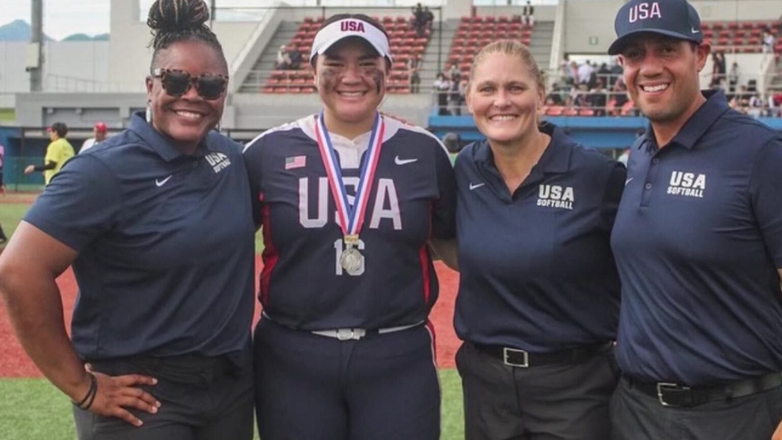 Kenya Lapuaho, middle left, is pictured as part of the USA’s Softball’s Under 15 Team.