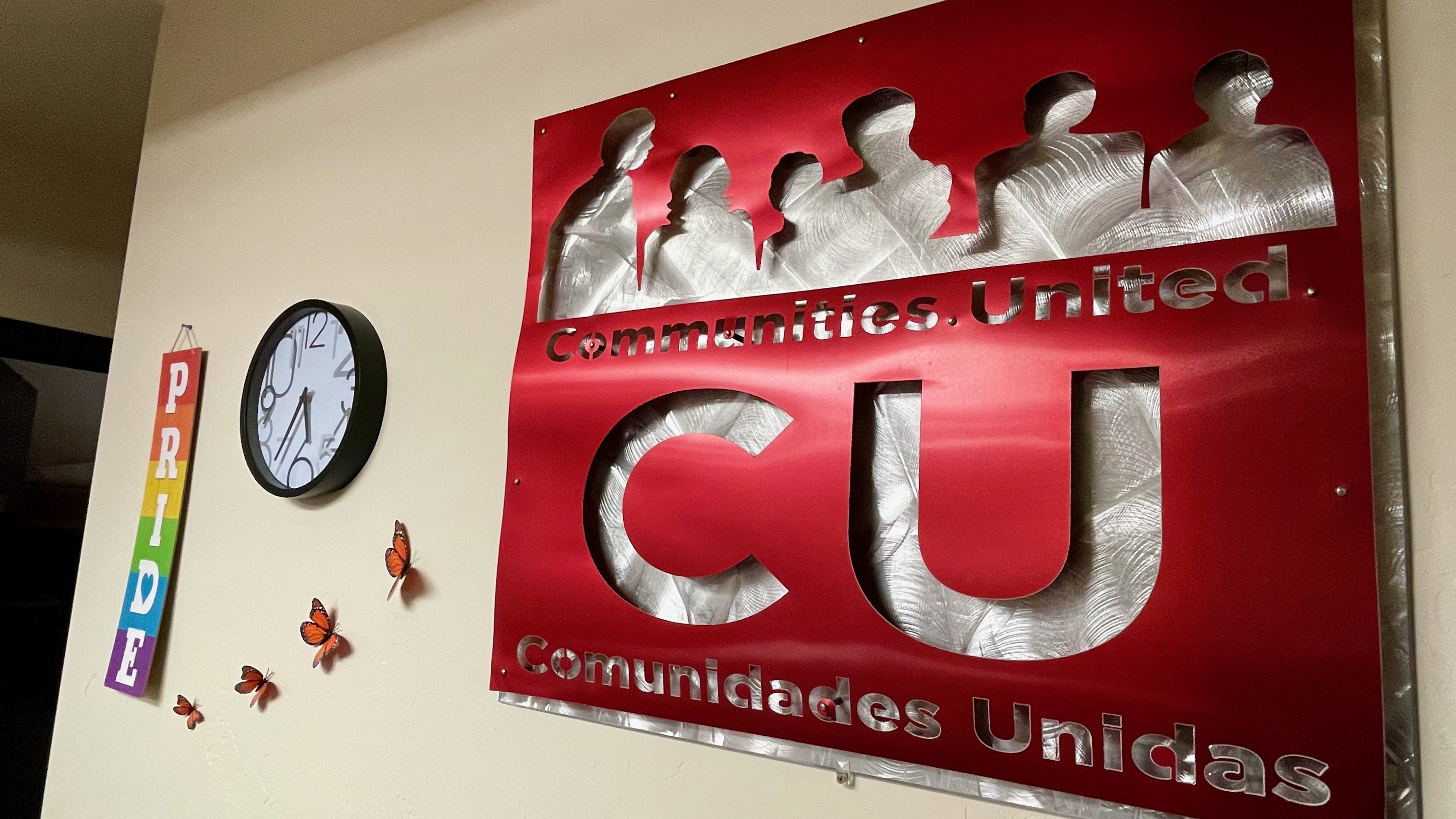 A Comunidades Unidas sign in the West Valley City offices of the organization, photographed Feb. 16. Group members are crafting a list of priority issues important to the Latino and immigrant communities.