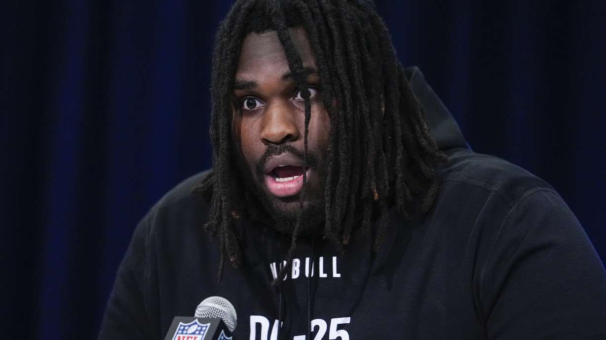 Texas defensive lineman T'Vondre Sweat jokes how people will react after he runs the 40-yard dash as he speaks during a press conference at the NFL football scouting combine in Indianapolis, Wednesday, Feb. 28, 2024.