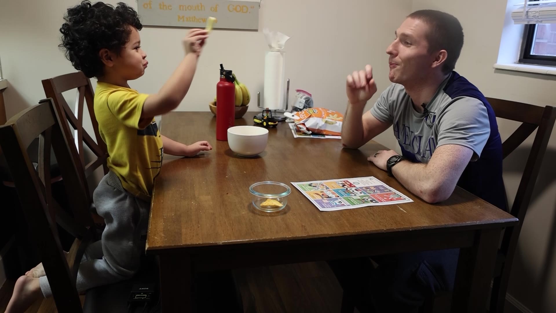 Delson with his father Brahms Billadeau use math to make snack time more fun.