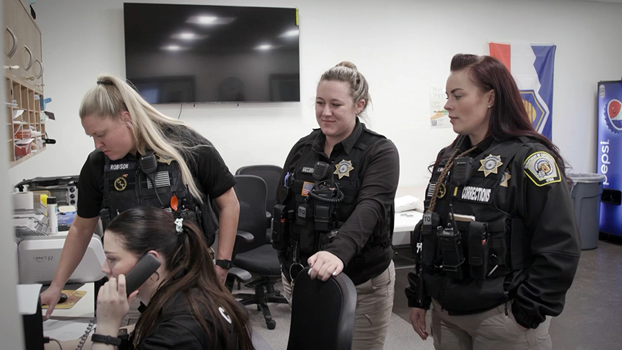 Corrections officers working inside the Utah State Correctional Facility in January 2024.