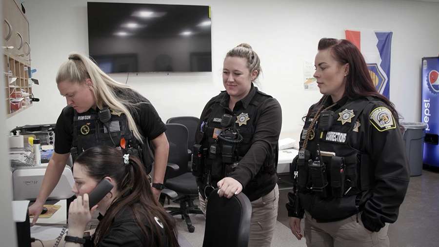 Corrections officers working inside the Utah State Correctional Facility in January 2024.
