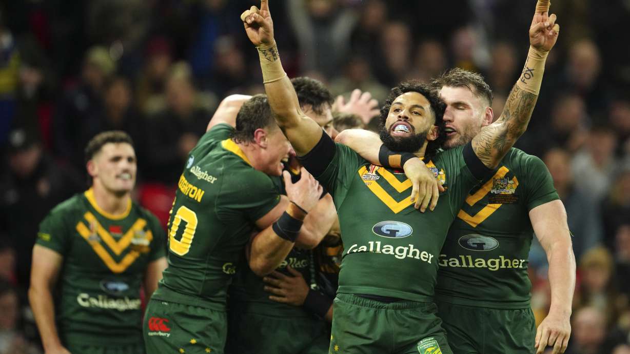 FILE - Australia's Josh Addo-Carr celebrates at the end of the Rugby League World Cup final match between Australia and Samoa at the Old Trafford Stadium in Manchester, England, Saturday, Nov. 19, 2022. When deciding whether to try to expand its impact to the United States, Australia's National Rugby League used a distinctly American sport as a model. A doubleheader Saturday night, March 2, 2024, at Las Vegas' Allegiant Stadium, which hosted the Super Bowl on Feb. 11, will be televised nationally in the U.S. on FS1.