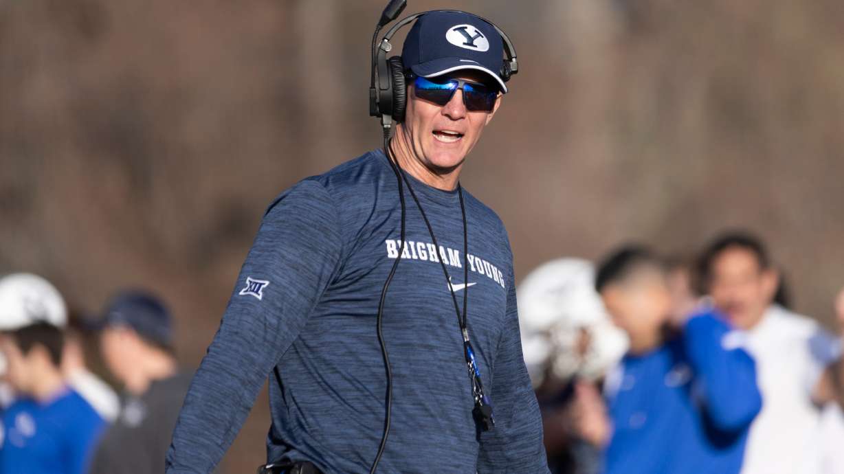BYU Football defensive coordinator Jay Hill yells to the team during a practice on the SAB outdoor practice fields at the start of spring camp in Provo on Thursday, Feb. 29, 2024.