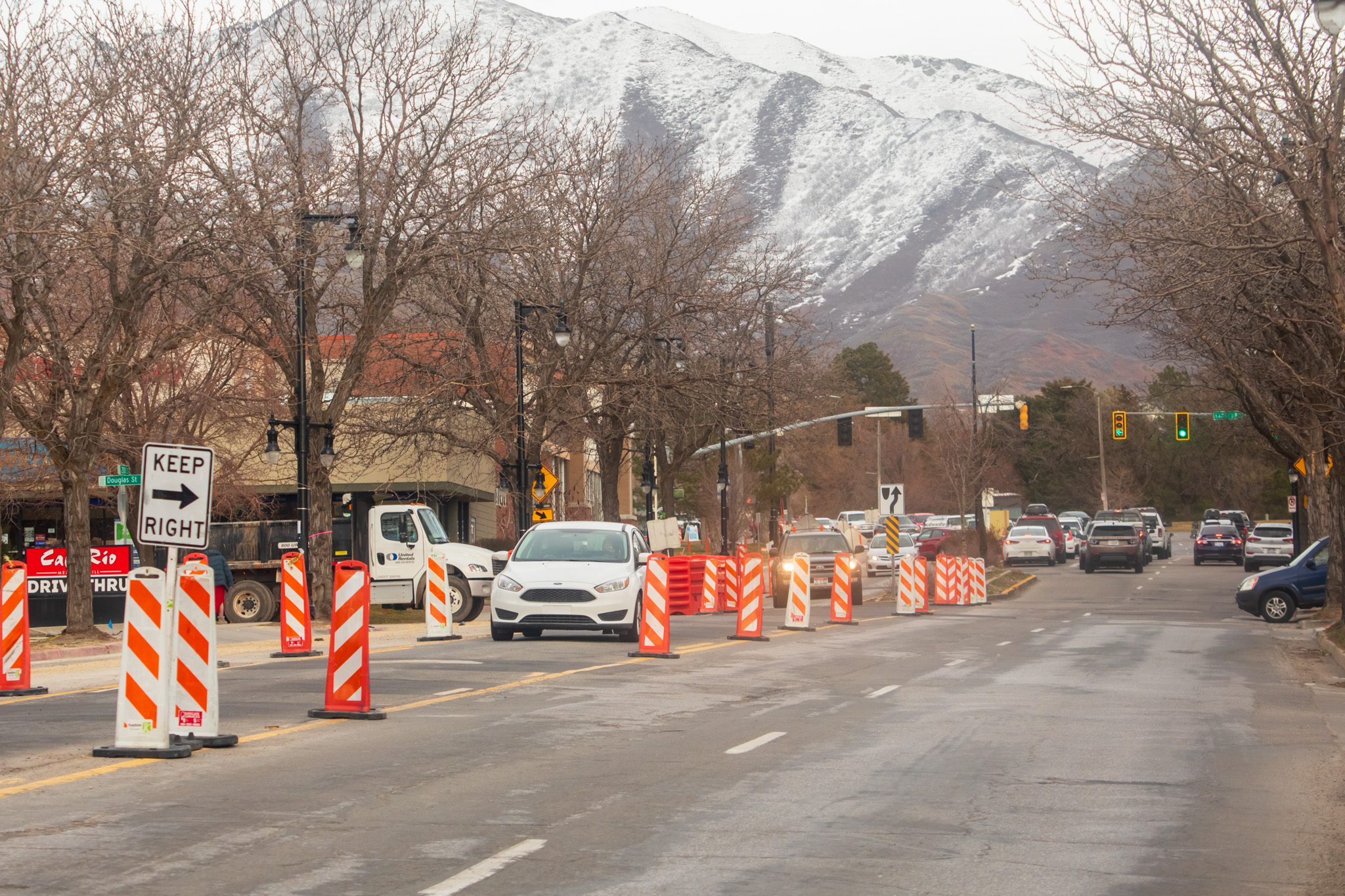 Vehicles travel across 2100 South in Salt Lake City's Sugar House neighborhood on Thursday. A two-year project to revamp the road is slated to begin on Monday.