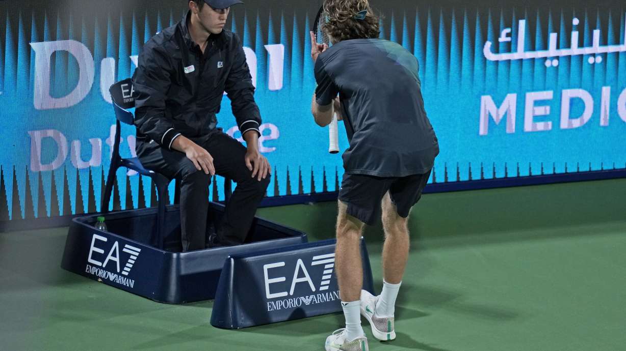 Andrey Rublev reacts in front a linesman during his semi final match with Alexander Bublik of Kazakhstan at the Dubai Duty Free Tennis Championships in Dubai, United Arab Emirates, Friday, March 1, 2024.