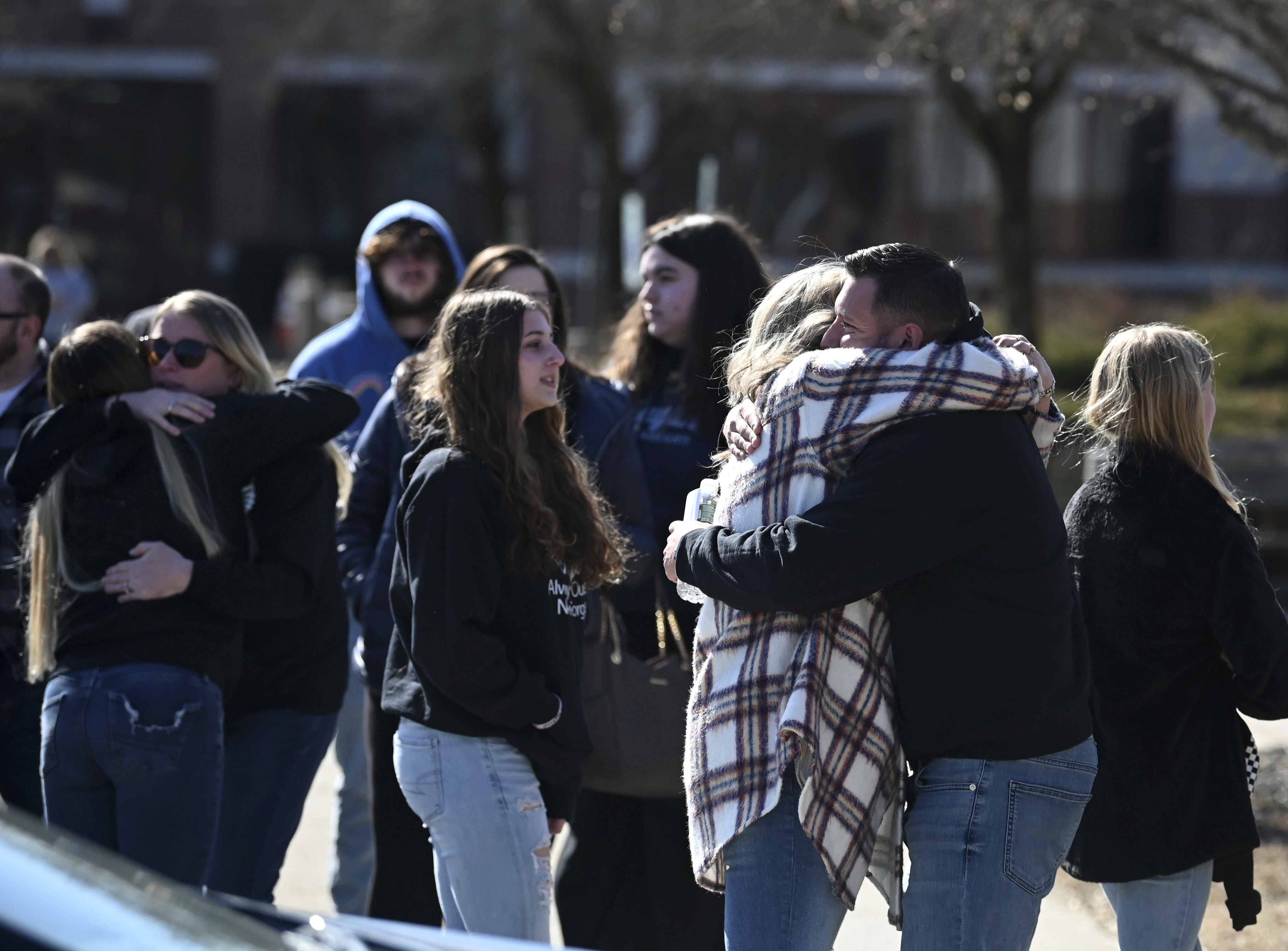 Andrew B. Gillis, right, father of slain daughter, Kaylin Gillis, thanks family and supporters following a sentencing for Kevin Monahan on Friday at Washington County Courthouse in Fort Edward, N.Y. Monahan who fatally shot 20-year-old Kaylin Gillis after the SUV she was riding in mistakenly drove into his rural driveway, was sentenced Friday to 25 years to life in prison.