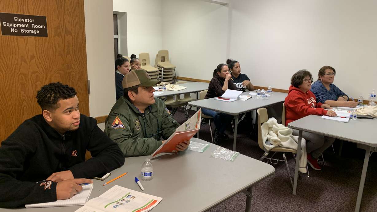 Students listen in a beginning English class at a Provo community resource center at a Latter-day Saint meetinghouse on Tuesday.