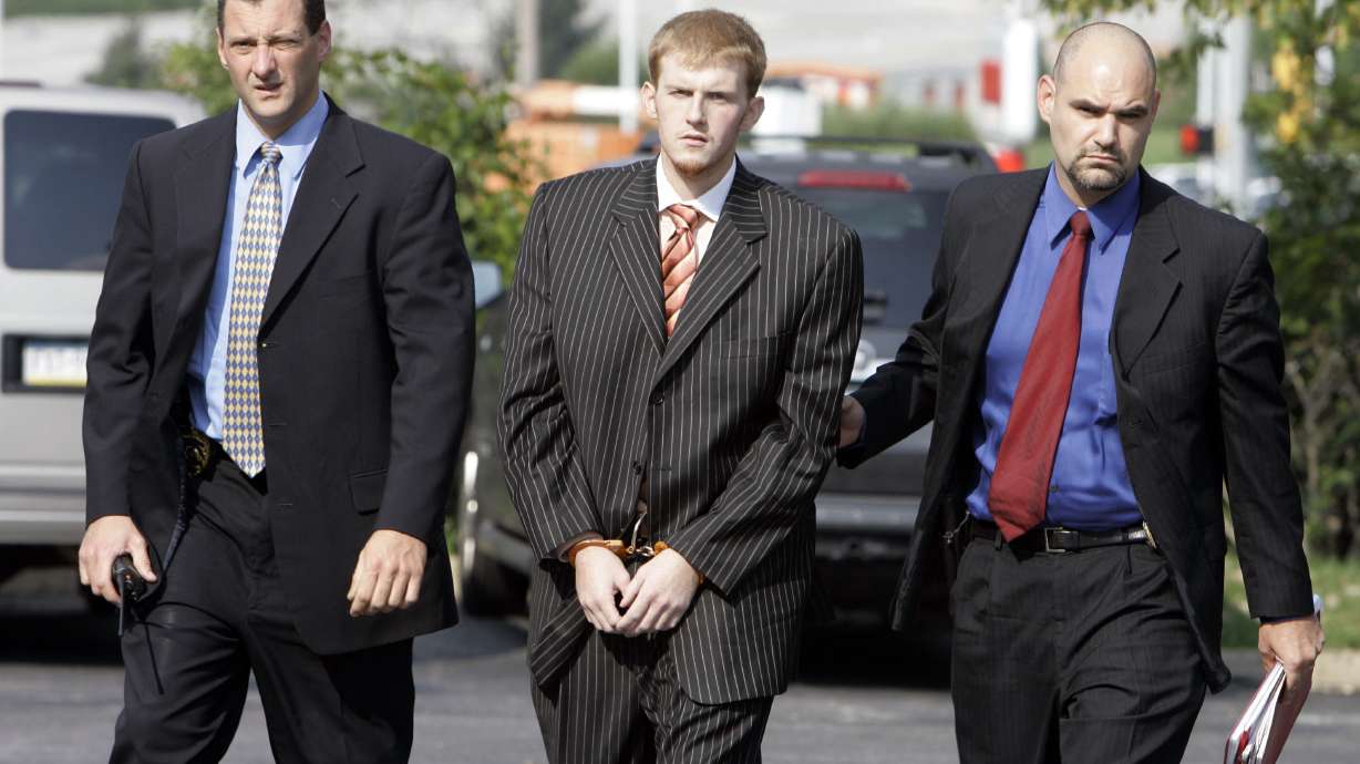 FILE - In this Aug. 29, 2007, file photo, former Kansas City Chiefs assistant coach Britt Reid is escorted into the Montgomery County district court house in Conshohocken, Pa. Missouri Gov. Mike Parson on Friday, March 1, 2024, shortened the prison sentence of Reid for a drunken driving crash that seriously injured a 5-year-old girl.