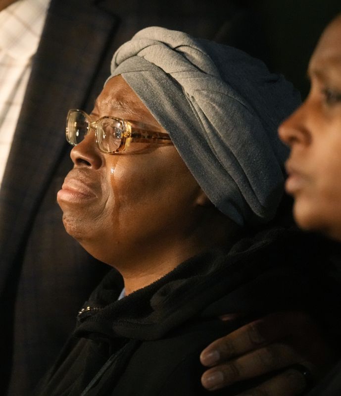 Sheneen McClain, Elijah McClain's mother, is consoled by Omar Montgomery outside the Adams County Colo., Justice Center after a verdict was rendered Dec. 22, 2023, in Brighton, Colo.