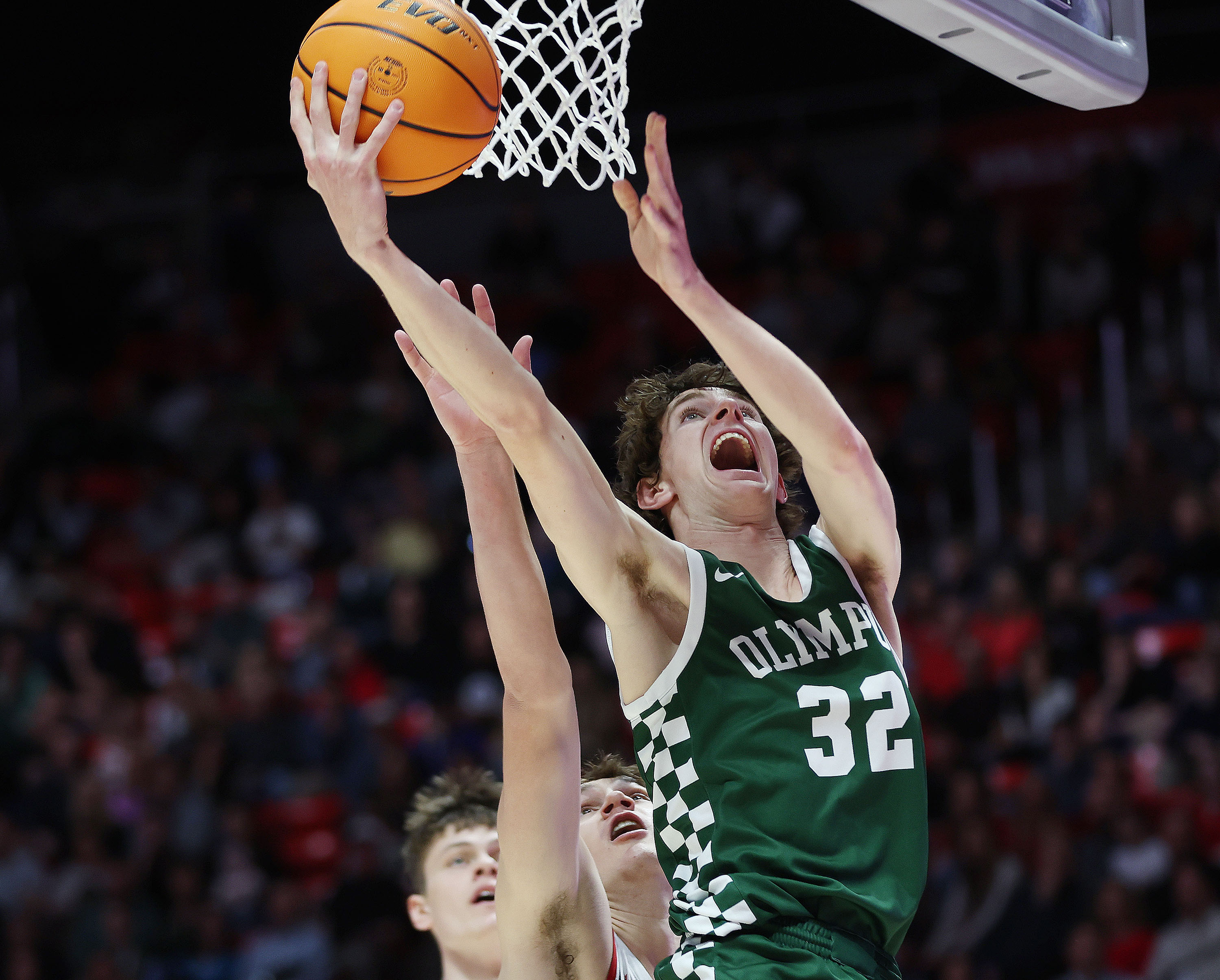 Olympus' Reef Smylie (32) puts up a shot against Alta during the 5A state championship game in Salt Lake City on Friday, March 1, 2024.
