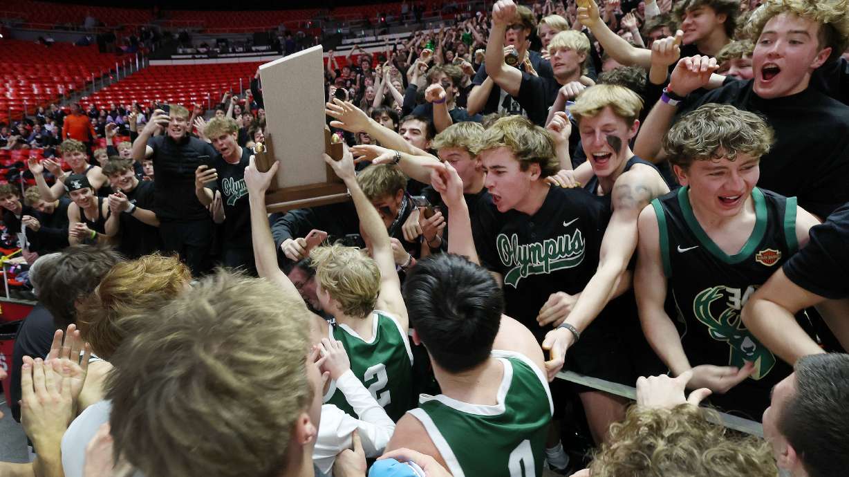 Olympus celebrates their win over Alta in the 5A state championship game in Salt Lake City on Friday, March 1, 2024. Olympus won 69-61.