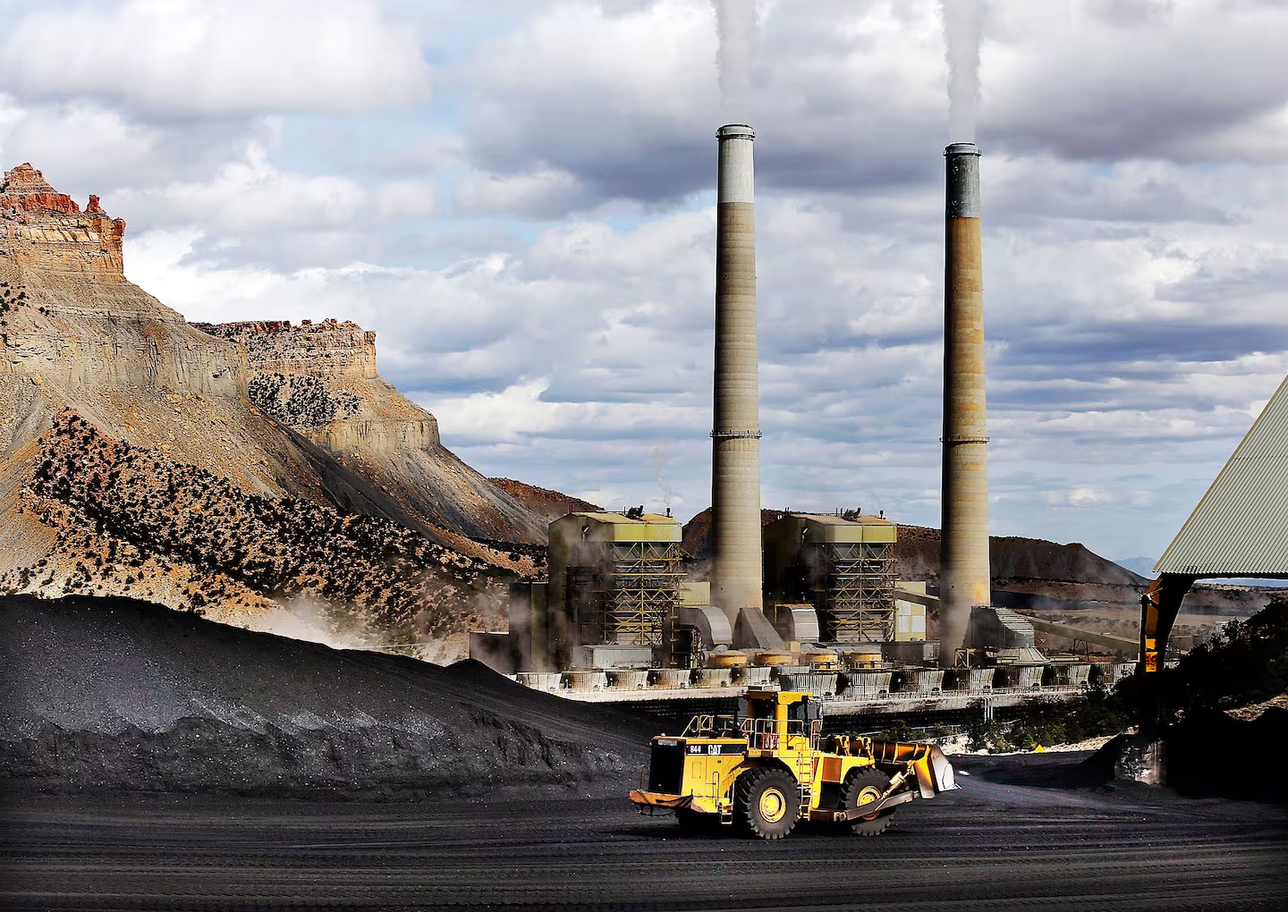 A loader moves coal at the Huntington power plant in Huntington, March 24, 2015. Utah lawmakers pushed and passed significant measures they assert prioritize keeping the lights on by hanging onto coal, despite regulatory and activist pressure.
