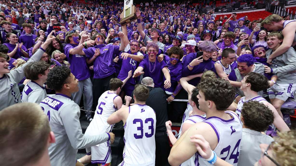 Lehi celebrates their win over Corner Canyon with the student body in the 6A state championship game in Salt Lake City on Friday, March 1, 2024. Lehi won 78-67.