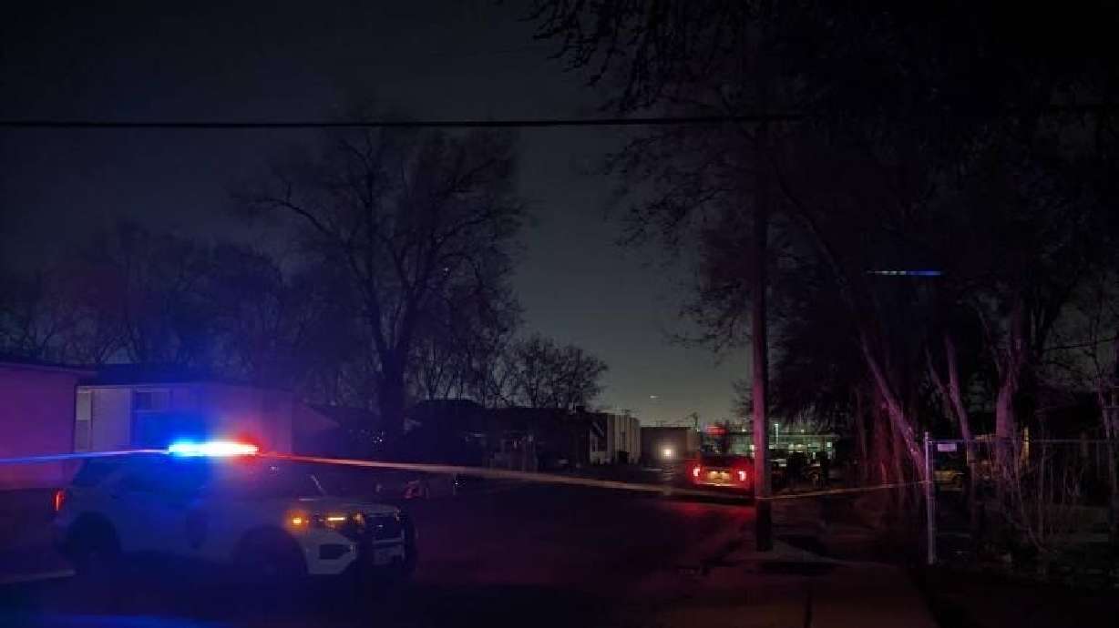 Police respond to a shooting death in South Salt Lake on Friday.