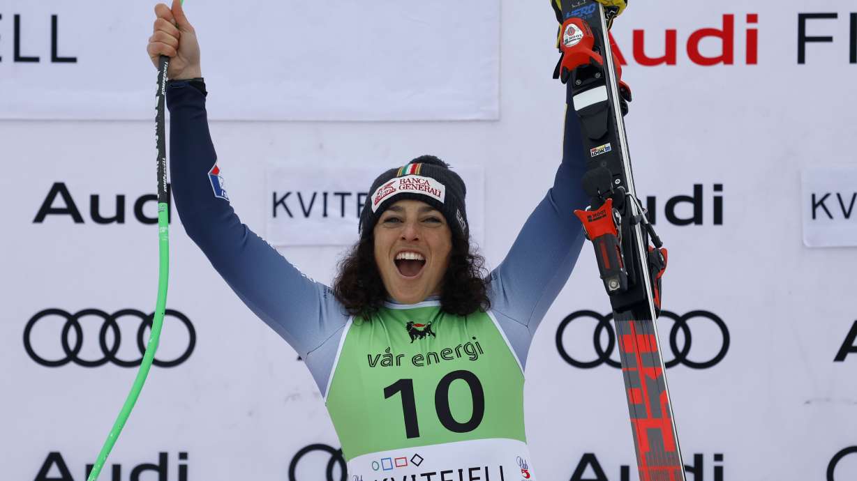 Italy's Federica Brignone celebrates winning an alpine ski, women's World Cup super-G race, in Kvitfjell, Norway, Sunday, March 3, 2024.