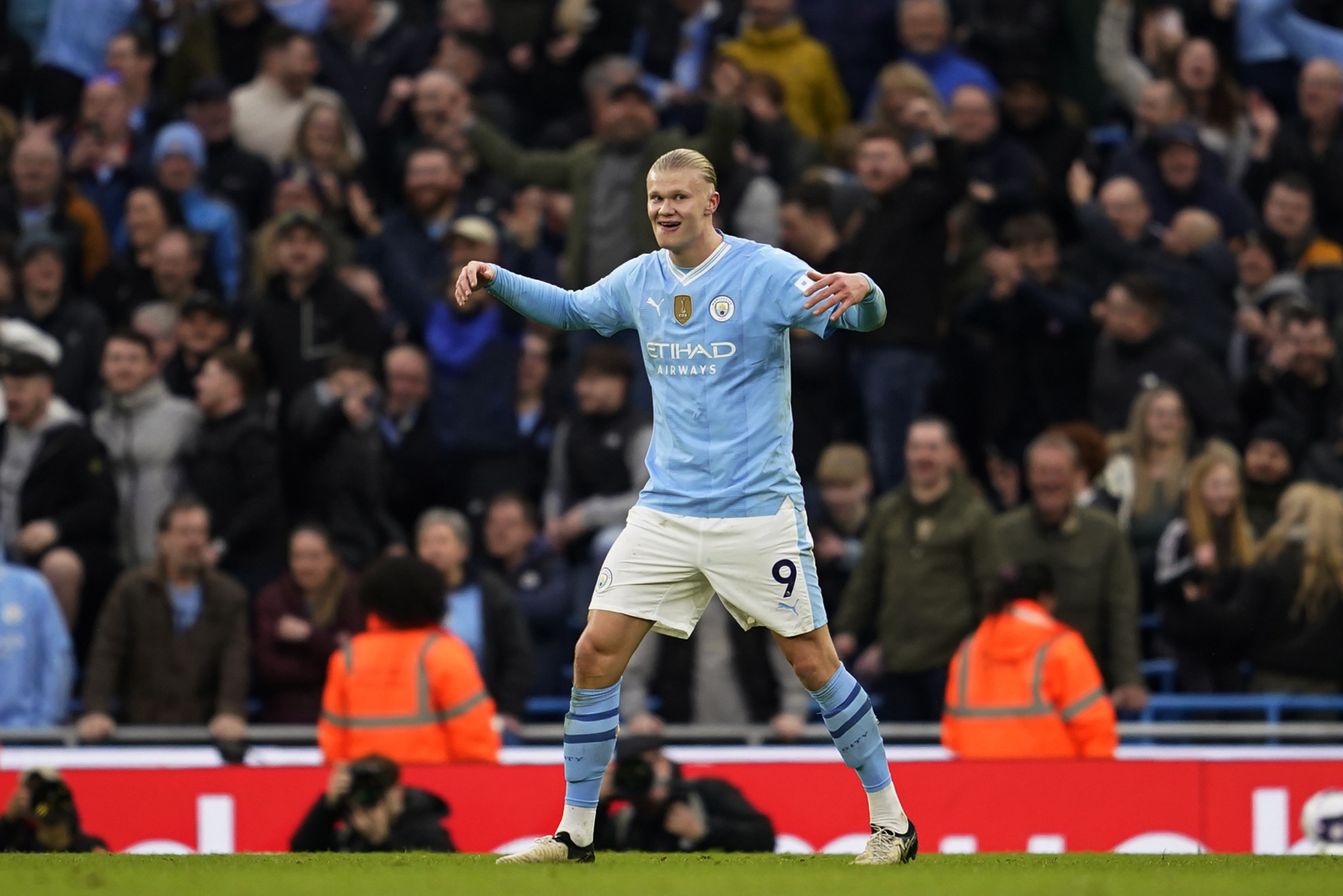 Manchester City's Erling Haaland celebrates after scoring his side's third goal during an English Premier League soccer match between Manchester City and Manchester United at the Etihad Stadium in Manchester, England, Sunday, March 3, 2024. 