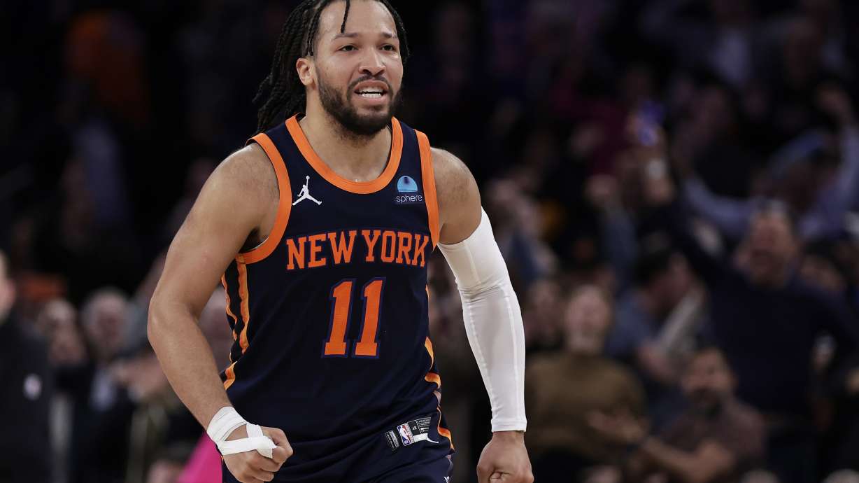 New York Knicks guard Jalen Brunson reacts during the second half of an NBA basketball game against the Detroit Pistons, Monday, Feb. 26, 2024, in New York.